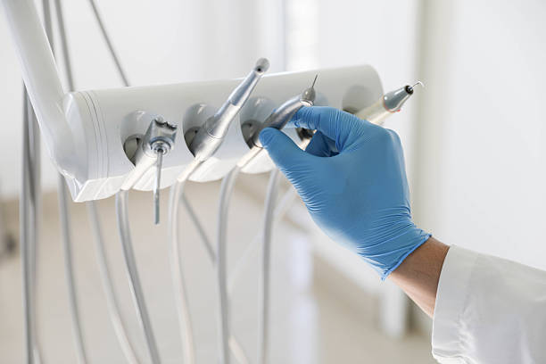 Professional Emergency Dentist technician working in Palm Desert, CA